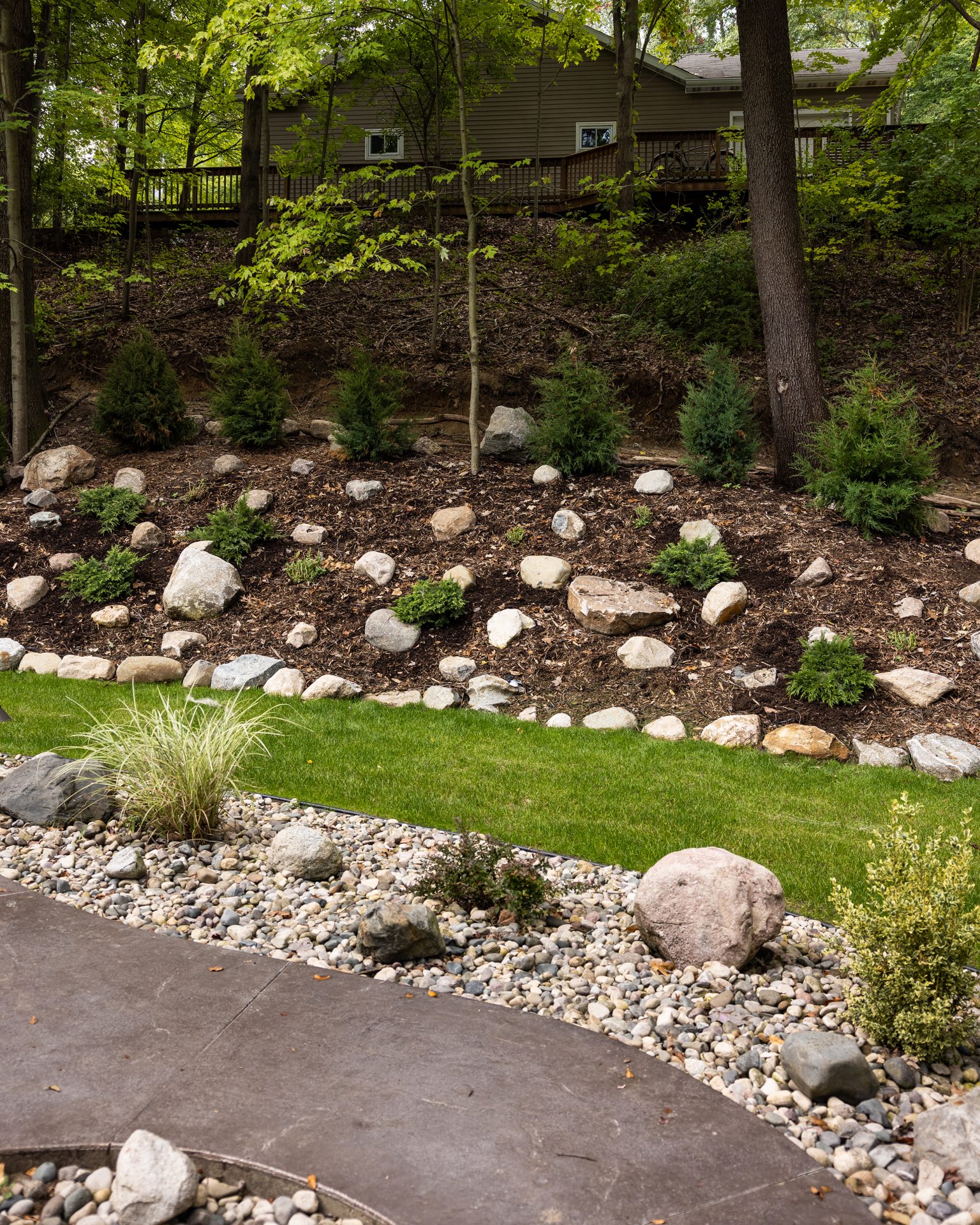 Garden path with stones and greenery