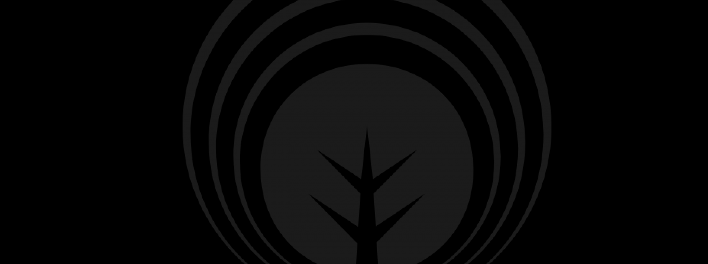 Abstract tree silhouette with circular patterns.